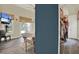 A bedroom area featuring wood floors, a fan and a walk-in closet at 4541 School Rd, Land O Lakes, FL 34638