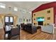 Bright and airy living room with a dining area, featuring high ceilings and ample seating at 4541 School Rd, Land O Lakes, FL 34638