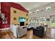 Inviting living room featuring comfortable seating, stylish decor, and lots of natural light at 4541 School Rd, Land O Lakes, FL 34638