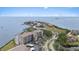 Stunning aerial view capturing the condo building's proximity to the water and surrounding residential neighborhood at 4550 Bay Blvd # 1231, Port Richey, FL 34668