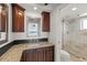Bathroom with granite countertops and a walk-in shower at 4550 Bay Blvd # 1231, Port Richey, FL 34668