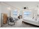 Bright bedroom with water views and a cozy rocking chair at 4550 Bay Blvd # 1231, Port Richey, FL 34668