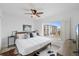 Bedroom with a large window and ceiling fan at 4550 Bay Blvd # 1231, Port Richey, FL 34668