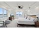 Bedroom with plantation shutters and water views at 4550 Bay Blvd # 1231, Port Richey, FL 34668