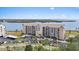 Beautiful waterfront condominium building featuring a well-maintained facade and ample parking at 4550 Bay Blvd # 1231, Port Richey, FL 34668