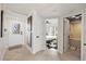 Hallway featuring the entrance, a bedroom, and a bathroom at 4550 Bay Blvd # 1231, Port Richey, FL 34668