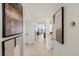 Interior view featuring neutral-toned hallway decor and tile flooring at 4550 Bay Blvd # 1231, Port Richey, FL 34668
