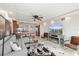 Comfortable living area with sleek furnishings, fireplace, and open view to the modern kitchen at 4550 Bay Blvd # 1231, Port Richey, FL 34668