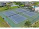 Aerial view of tennis courts in waterfront community at 4550 Bay Blvd # 1231, Port Richey, FL 34668