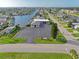 Aerial shot showcases the Gulf Harbors Civic Center location within a waterfront community with numerous canals and residences at 4918 Forecastle Dr, New Port Richey, FL 34652