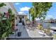 Inviting backyard deck with waterfront views, outdoor seating, and lush plants at 4918 Forecastle Dr, New Port Richey, FL 34652