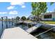 Dock and boat lift along waterfront at 4918 Forecastle Dr, New Port Richey, FL 34652