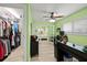 Bright home office with wood floors and a view of the bedroom and closet at 4918 Forecastle Dr, New Port Richey, FL 34652