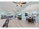 Open floor plan integrating living and dining areas, all enhanced with water views at 4918 Forecastle Dr, New Port Richey, FL 34652