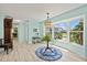Bright sitting area with a large bay window providing ample natural light at 4918 Forecastle Dr, New Port Richey, FL 34652