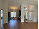 Large living room featuring hardwood floors, multiple rooms, and a bright and open layout at 5294 Elkin Ave, Spring Hill, FL 34606