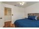 This bedroom has hardwood floors, natural lighting, and the bed is the centerpiece at 6125 Desert Peace Ave, Land O Lakes, FL 34639