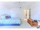 Spacious bedroom with plenty of natural light and minimal furnishings at 6172 Prestwick Ct, Spring Hill, FL 34606
