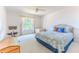 Bedroom with a large window that has natural light and carpet floors at 6172 Prestwick Ct, Spring Hill, FL 34606