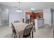 Dining room featuring table and chairs adjacent to the kitchen at 6273 Pinehurst Dr, Spring Hill, FL 34606