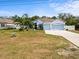 Charming single Gathering home with a three car garage and beautiful yard at 6273 Pinehurst Dr, Spring Hill, FL 34606