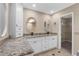 Bathroom features dual sinks, granite countertops, modern fixtures, and walk-in closet at 6321 Garland Ct, New Port Richey, FL 34652