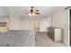 Spacious bedroom featuring neutral carpet, a large bed, and a stylish dresser at 6321 Garland Ct, New Port Richey, FL 34652
