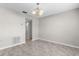 Neutral living room featuring stylish marble-look floors and updated lighting fixture at 6440 Curtiss Ln, Spring Hill, FL 34609