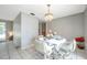 Bright dining area features a chandelier, a set table, and access to the living room and kitchen at 7035 Cutty Sark Dr, Port Richey, FL 34668