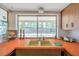 View of a kitchen sink with a large window overlooking the backyard and bright countertops at 7035 Cutty Sark Dr, Port Richey, FL 34668