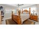 Inviting bedroom featuring a four-poster bed, neutral tones, and ample natural light at 713 715 W Fribley St, Tampa, FL 33603