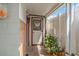 Charming entryway with tiled floors, welcome sign, and indoor plants at 713 715 W Fribley St, Tampa, FL 33603