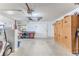 Garage with good storage options, work bench, golf cart parking, and lots of room for your extras at 7499 Blue Skies Dr, Spring Hill, FL 34606
