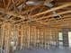 Interior view of framing showing the wooden structure, duct work, and layout of a new construction home at 7583 St Andrews Blvd, Weeki Wachee, FL 34613