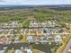 Waterfront living showcased in this aerial view of the home, neighborhood, and boating access at 7626 Hatteras Dr, Hudson, FL 34667