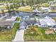 Waterfront property with easy canal access, complete with a backyard pool and boat dock, perfect for boating enthusiasts at 7626 Hatteras Dr, Hudson, FL 34667