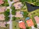 Aerial view of homes, pools, landscaping, and neighborhood in the lovely community at 9124 Topneck St, New Port Richey, FL 34654