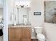Bathroom featuring granite counters, and a tiled shower with glass door at 9125 Palm Beach Dr, Brooksville, FL 34613