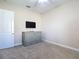 Neutral bedroom with carpet and dresser at 9125 Palm Beach Dr, Brooksville, FL 34613