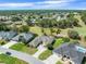 Beautiful aerial view showcasing homes located on a golf course at 9216 Tarleton Cir, Weeki Wachee, FL 34613