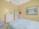 Inviting bedroom with neutral walls, ceiling fan, and closet at 9216 Tarleton Cir, Weeki Wachee, FL 34613