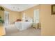 Serene main bedroom with plantation shutters and ample natural light at 9216 Tarleton Cir, Weeki Wachee, FL 34613