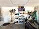 Well organized garage with ample storage shelves and space for parking a car at 9311 Haas Dr, Hudson, FL 34669