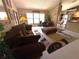 Living room with vaulted ceilings, sitting area, and open floor plan at 9311 Haas Dr, Hudson, FL 34669