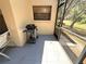 The screened patio includes a grill, creating an ideal outdoor cooking and dining space at 9311 Haas Dr, Hudson, FL 34669