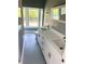 Modern bathroom featuring double vanity, sleek fixtures, and a bright window at 9930 San Diego Way, Port Richey, FL 34668