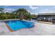 Backyard pool with waterfront access at 9930 San Diego Way, Port Richey, FL 34668