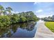 Scenic canal bordered by trees at 9930 San Diego Way, Port Richey, FL 34668