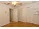 Bedroom with a closet and shelving storage at 9942 Woodridge Ct, Port Richey, FL 34668