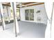 Inviting covered patio perfect for outdoor entertaining and shielded from the elements at 9942 Woodridge Ct, Port Richey, FL 34668
